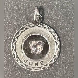Estate, Vintage Sterling Silver “June”Pendant with pale yellow stone.